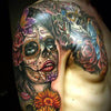 Chest To Arm Tattoos