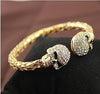 Antique Rhinestone Double Skull Bangle