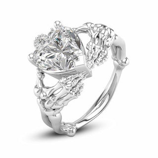 SKULL HANDS HOLDING DIAMONDS