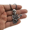Vintage Silver Tone Playing Guitar Skull Necklace